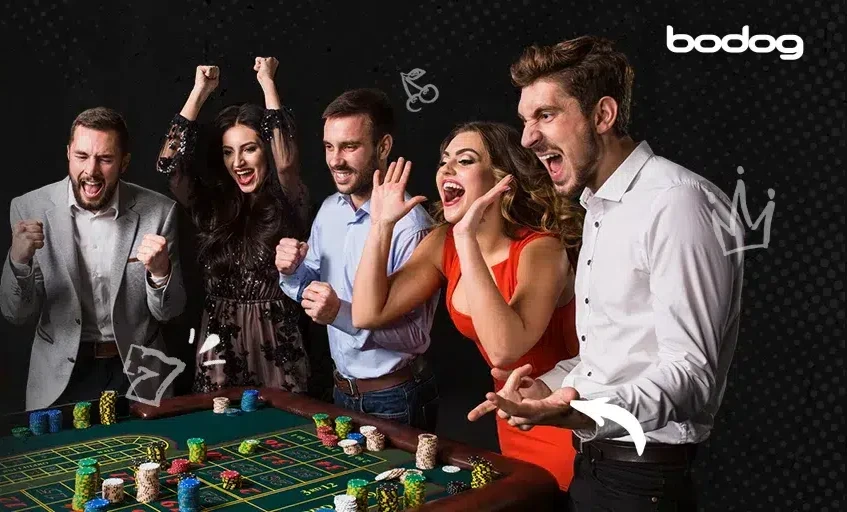 Jugadores en una mesa de ruleta de Bodog Casino
